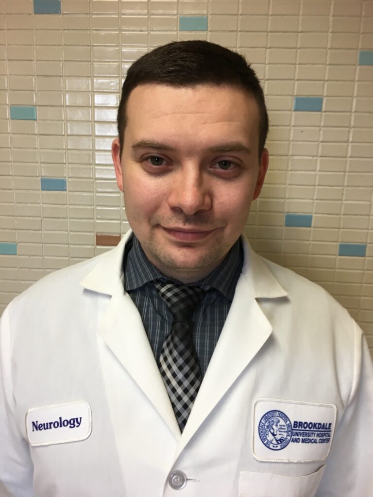 Headshot of Dr. Artem Sunik Smiling